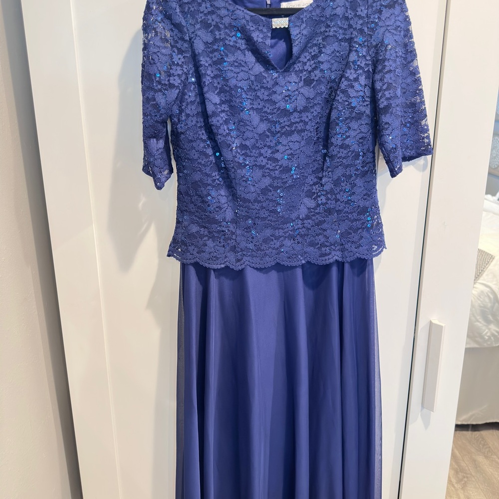 Jackie Jon New York Elegant Blue Lace Dress. stretch lace top back zipper.